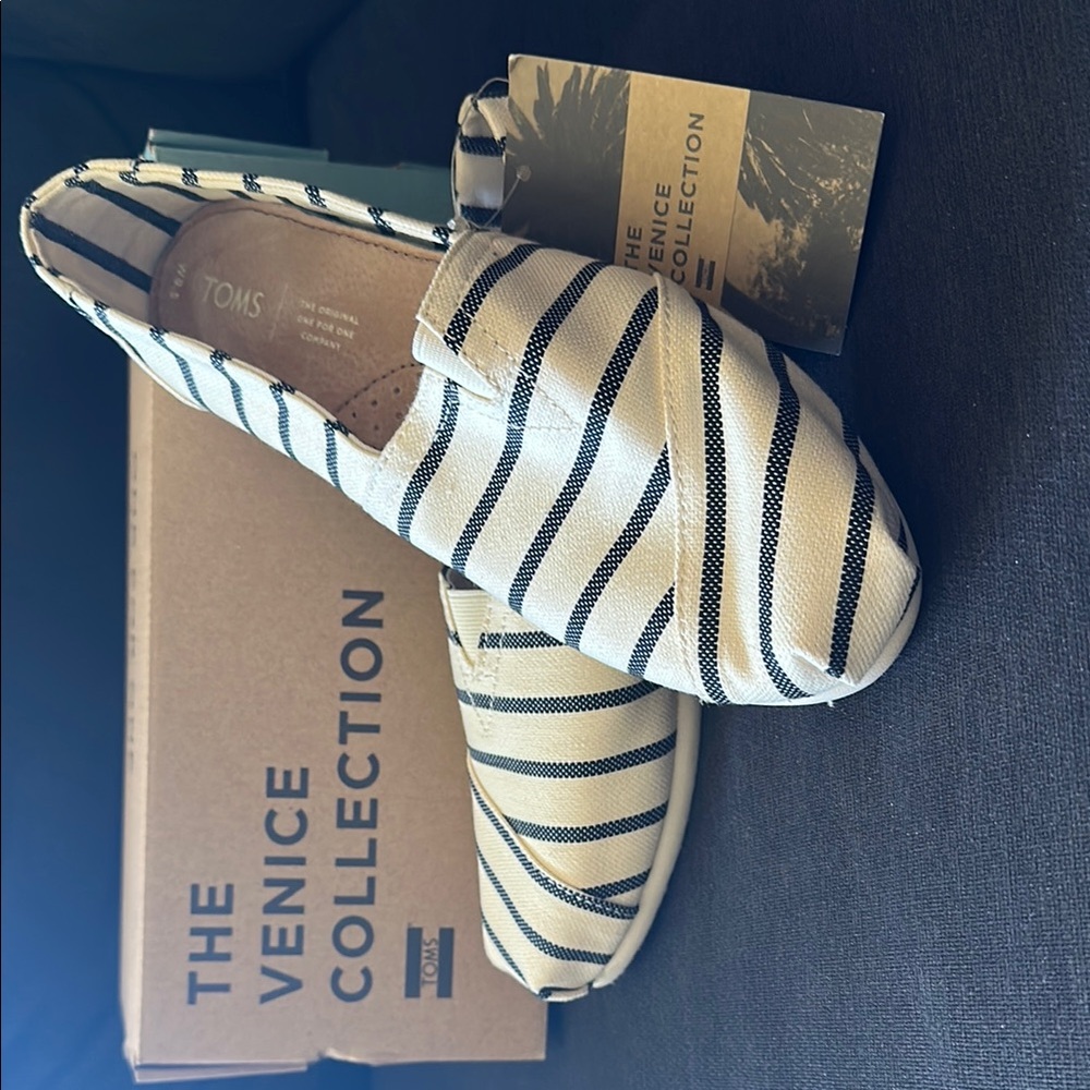 TOMS Black and Cream Striped Slip-Ons